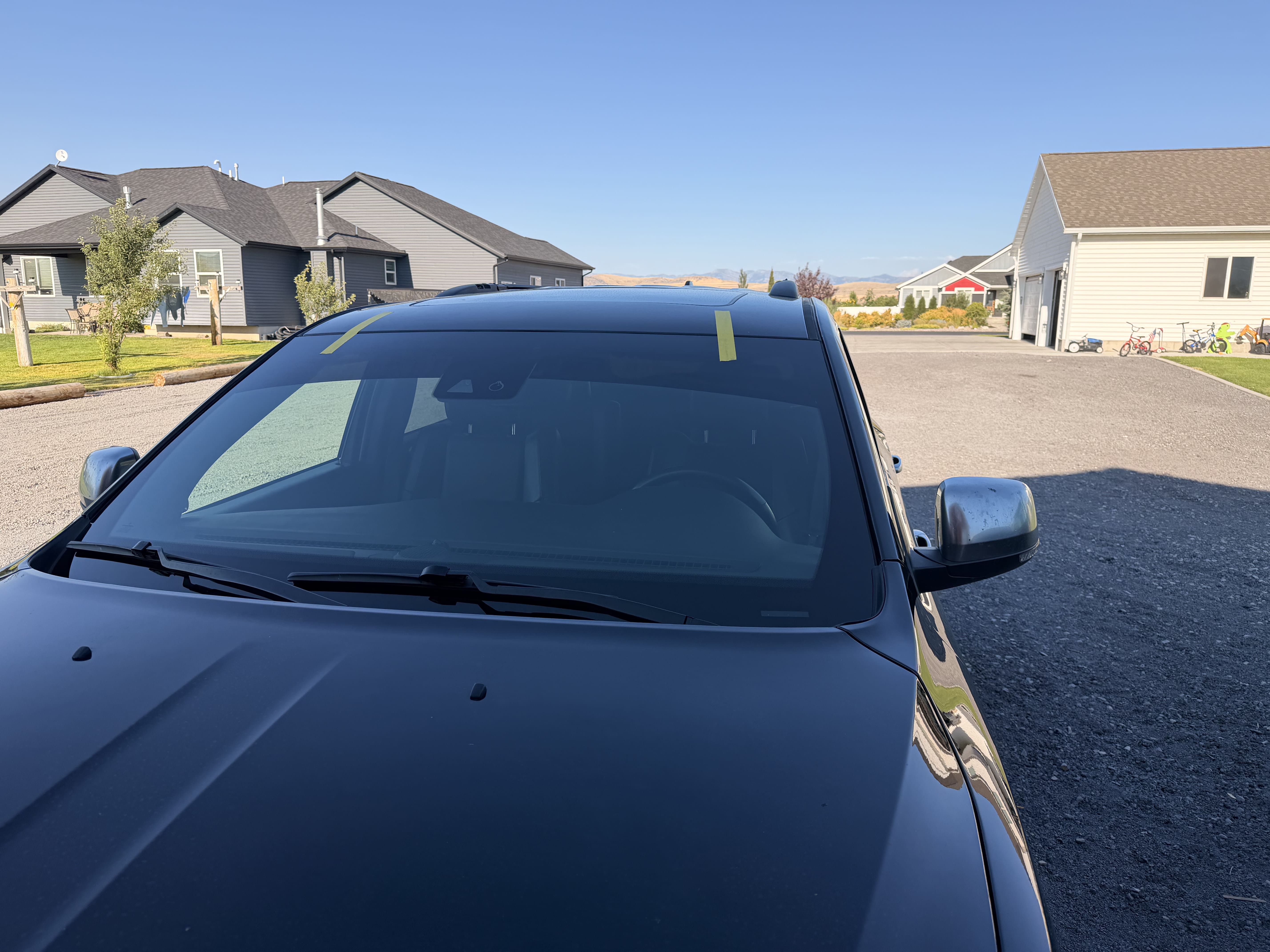 New windshield installed on a dark SUV